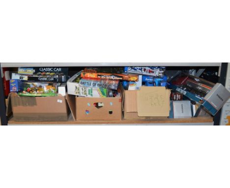 Shelf of assorted plastic and diecast models etc.