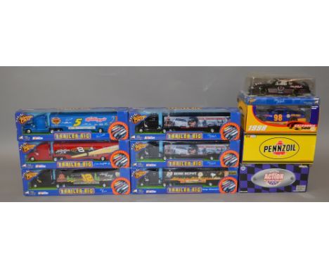 18 x Action diecast racing models, mainly Nascar: 12 x 1:24 scale cars; six trailer rigs. Boxed, appear E.