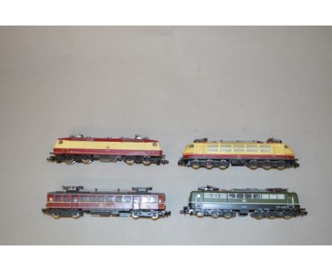 N Gauge. 4 x unboxed DB railways locomotives. Fleischmann, RoCo etc. Overall G some missing buffers.