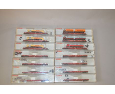N Gauge Fleischmann. Road Train, comprising of 14 x vehicles some with loads. VG in G boxes.