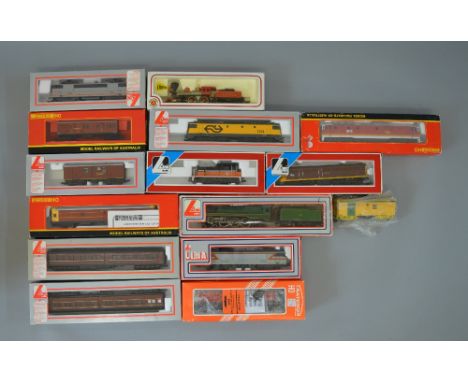 H0 Scale 9 x continental locomotives including SNCF, Dutch railways etc, together with 6 x rolling stock & spare power bogie.