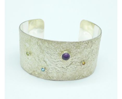 A designer 925 silver bangle, signed NB, 48g 