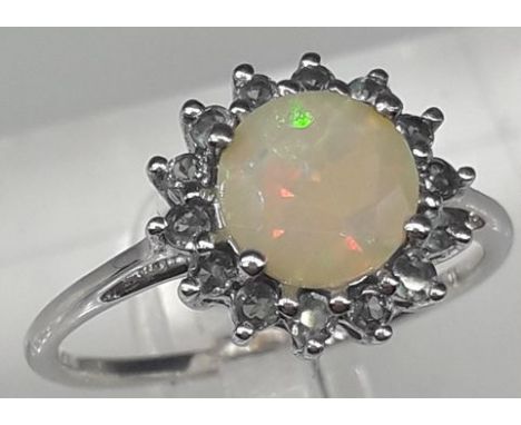 A 9ct gold and synthetic opal ring, 2.1g, N 