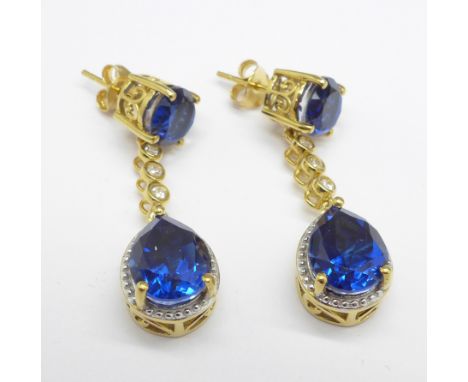 A pair of silver gilt earrings set with Cambodian zircon 