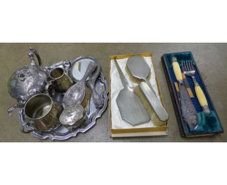 Victorian fish servers by Haywood, case a/f, a plated teapot, two brush sets, a cream and sugar, a tray and a trinket box **P
