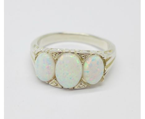 A silver and synthetic opal ring, Q 