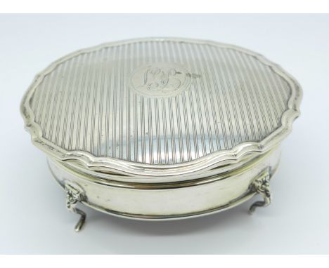 A silver trinket box on four feet, Birmingham 1922, with initials, 97mm 