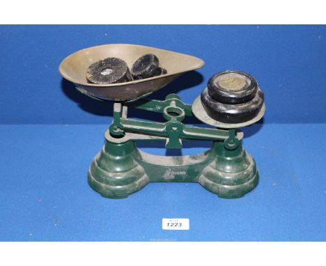 A set of Librasco scales with various weights.