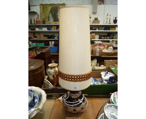 A 1960's West German ceramic lamp with original shade.