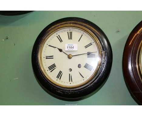 An unusually small ebonised cased single train movement Wall Clock having Roman numerals, 10 1/4'' diameter, the face 7 1/4''