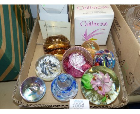 A quantity of assorted paperweights to include Caithness 'Cauldron', Caithness 'Moon Crystal', Selkirk 'Carnival' etc.