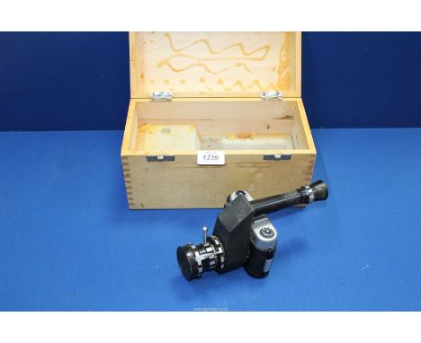 A Robot Vollautomat 35mm camera with telescope attachment in a wooden case.