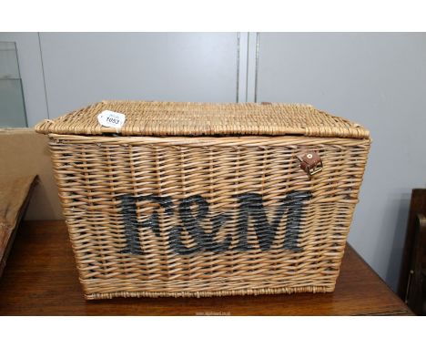 A large Fortnum and Masons hamper with lid, 22" long, 14" high.