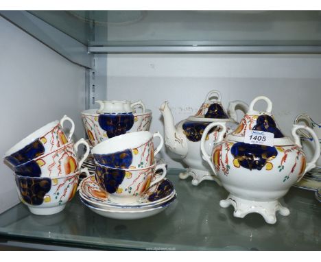 A Gaudy Welsh part Teaset comprising teapot, lidded sucrier, sugar bowl, cream jugs, five cups, saucers and tea plates and tw