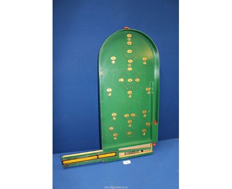 A mid 19th century Chad Valley 'Bagatelle' board game, 26'' long.