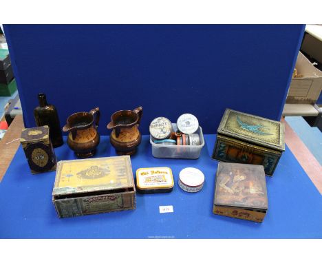 A quantity of old tins (some containing old Meccano pieces), a cigar box, Lyons tea caddy with perpetual calendar to the fron