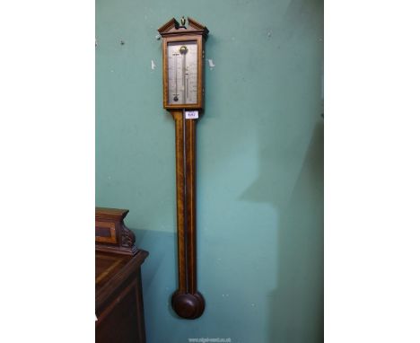 A good quality Comitti of Holborn mahogany and satinwood inlay mercury Stick Barometer, the silvered face enclosed by a glass