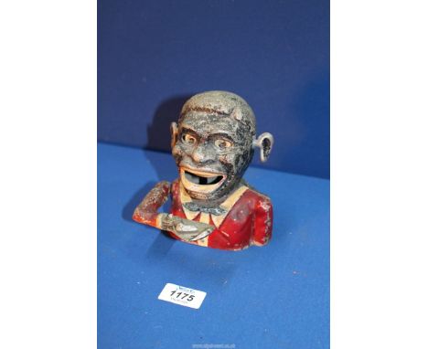 A "Jolly Man" Starkies Patent Money box.These items are listed on the basis they are illustrative of a bygone culture in whic