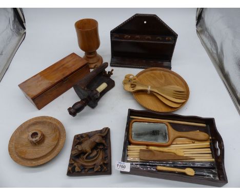 A quantity of treen including; pipe rack, candle sconce, small tray, etc.