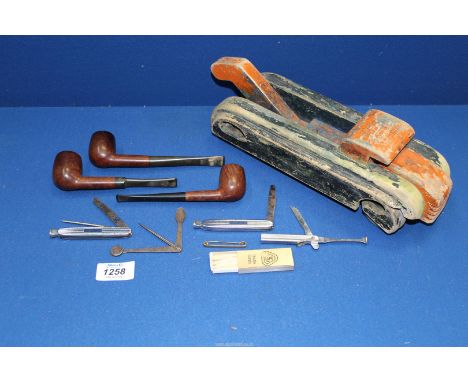 A 1940's wooden recovery truck, three Pipes, one by Smoke Craft Premier and another Bewlay Standard, Pipe tampers, Rolled gol
