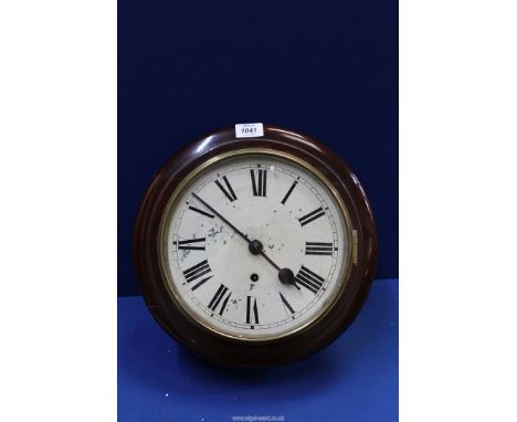 A circular dial, single train movement Wall clock having Roman numerals, no pendulum or winder present, 13 1/2'' diameter, th