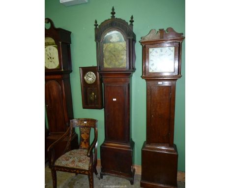 A darkwood strung Mahogany cased Longcase Clock, the eight day movement having a brass face with Roman hour numerals and Arab