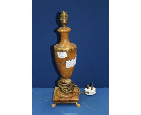 A Marble table lamp with brass detail and stand, 15 1/2" tall.