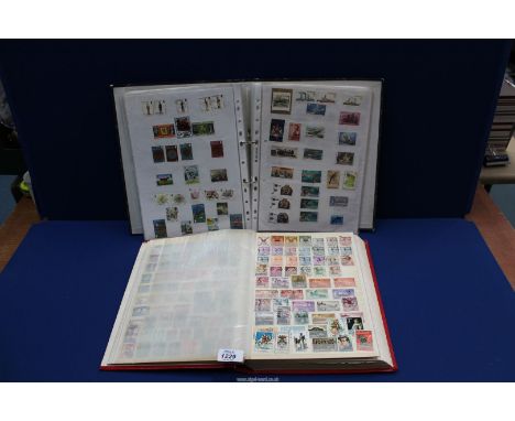 Two albums of Stamps including USA, Spain, Bermuda, Kenya, Indonesia, etc.