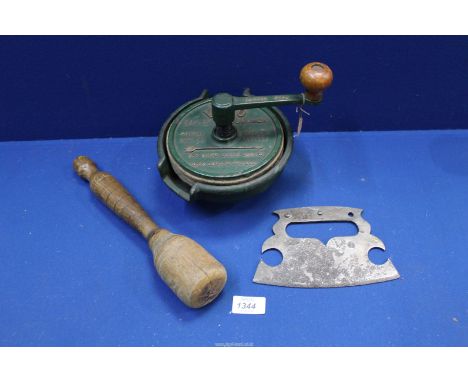 A Georgian cook's vegetable chopper, a turned wood pestle/potato masher having an acorn finial, 11 3/4'' long and a Vino No. 