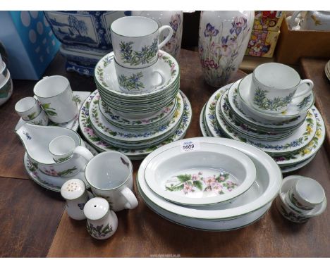 A Worcester "Herbs" tea and dinner service including dinner plates, bowls, two mugs, egg cups, etc. (49 pieces).