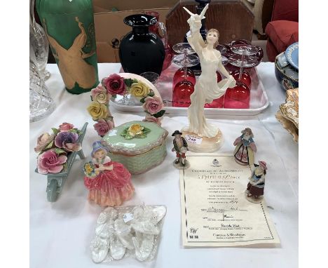 A Royal Doulton figure "Cissie"; a Royal Worcester figure "Spirit of Peace"; encrusted china; etc. 