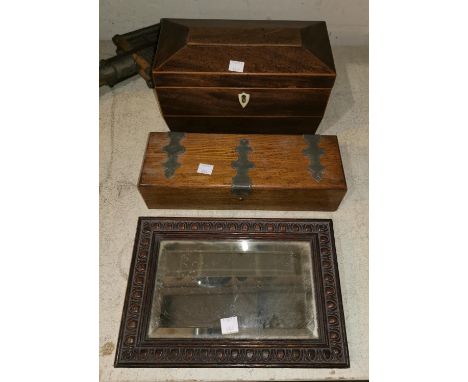 A Georgian mahogany sarcophagus shaped tea caddy; a mirror; a brass bound box 