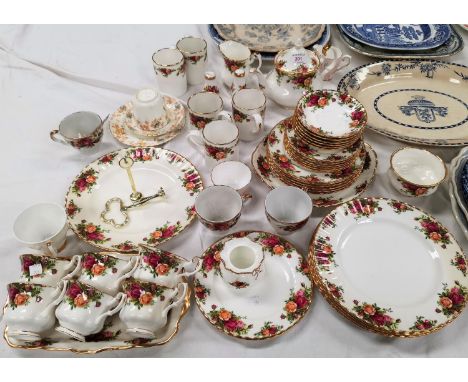 A Royal Albert Old Country Roses tea and dinner service, 35 pieces; 3 bone china trio sets; etc. 