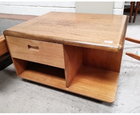 A 1970's pale oak coffer table with cupboard, drawer and shelf under, 28" x 24"