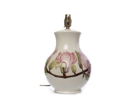 MOORCROFT 'MAGNOLIA' PATTERN TABLE LAMP BASEimpressed marks to base, tube-lined design, decorated with pink flowers on a crea