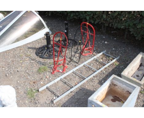 Three saddle rack and a small, galvanised ladder