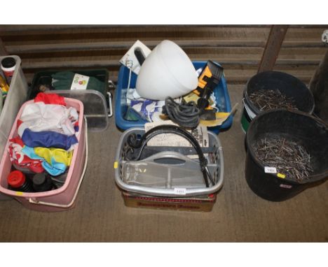 Two boxes containing a glass chimney, gate hinges, lightshade, JCB outdoor plug socket etc.