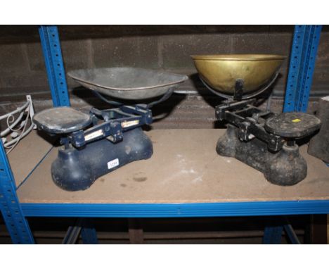 A set of W&T Avery Ltd weighing scales to weigh 14Ibs with galvanised pan and a further set of weighing scales with brass pan