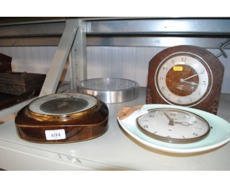 A Peter wall clock, an oak cased mantel clock and two other wall clocks