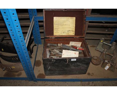 A wooden tool chest and contents of tools; to include files, scrapers etc.