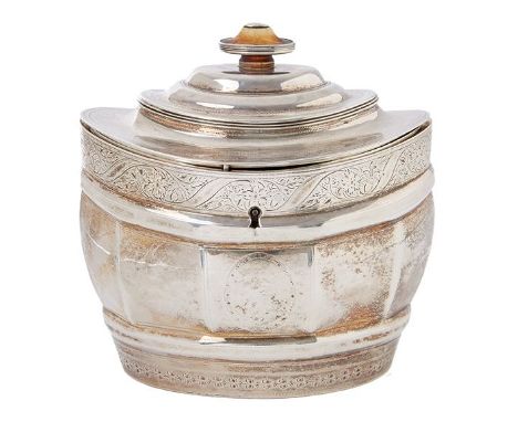 A GEORGE III SILVER TEA CADDY BY SOLOMON HOUGHAM A GEORGE III SILVER TEA CADDY BY SOLOMON HOUGHAM, LONDON 1801 Of faceted ova