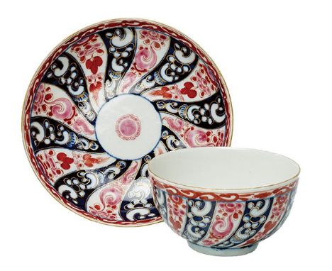 A WORCESTER DR WALL PORCELAIN TEA BOWL AND SAUCER A WORCESTER DR WALL PORCELAIN TEA BOWL AND SAUCER, CIRCA 1770 Painted with 