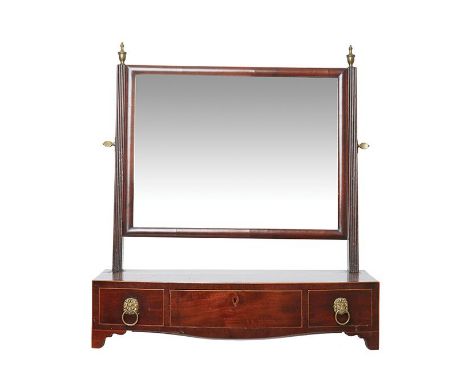 A GEORGE III MAHOGANY TOILET MIRROR, CIRCA 1810 The rectangular plate with... A GEORGE III MAHOGANY TOILET MIRROR, CIRCA 1810