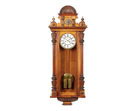 A VIENNA TWIN WEIGHT AND REGULATOR WALL CLOCK A VIENNA TWIN WEIGHT AND REGULATOR WALL CLOCK, CIRCA 1880 Within a walnut case 