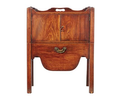 A GEORGE III MAHOGANY NIGHT TABLE, CIRCA 1800 The shaped gallery top with... A GEORGE III MAHOGANY NIGHT TABLE, CIRCA 1800 Th