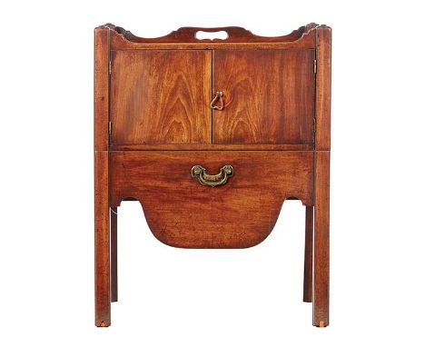 A GEORGE III MAHOGANY NIGHT TABLE, CIRCA 1800 The shaped gallery top with... A GEORGE III MAHOGANY NIGHT TABLE, CIRCA 1800 Th