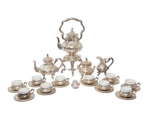 AN ITALIAN SILVER TEA SERVICE, MAKER ACC RETAILED BY GINEVRA BERNASCONI AN ITALIAN SILVER TEA SERVICE, MAKER ACC RETAILED BY 