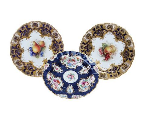 A PAIR OF ROYAL WORCESTER PORCELAIN PLATES AND ONE OTHER A PAIR OF ROYAL WORCESTER PORCELAIN PLATES AND ONE OTHER, 1909 AND 1