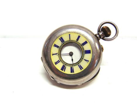 A HALF HUNTER STYLE FOB WATCH stamped '955', the cover with an enamel chapter to the bulls eye glass, with a keyless wind bar