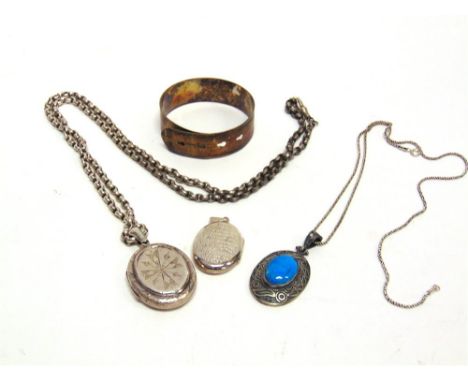 A SILVER BANGLE locket on chain; a locket; and a pendant on chain